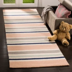 Safavieh Kids SFK916 Hand Tufted Area Rug - Safavieh