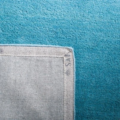 Mandy Solid Tufted Rug - Safavieh 5 Mandy Solid Tufted Rug - Safavieh - Image 5