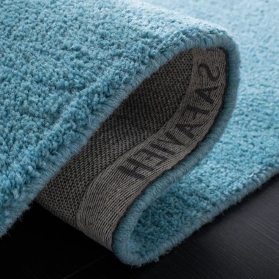 Mandy Solid Tufted Rug - Safavieh 4 Mandy Solid Tufted Rug - Safavieh - Image 4